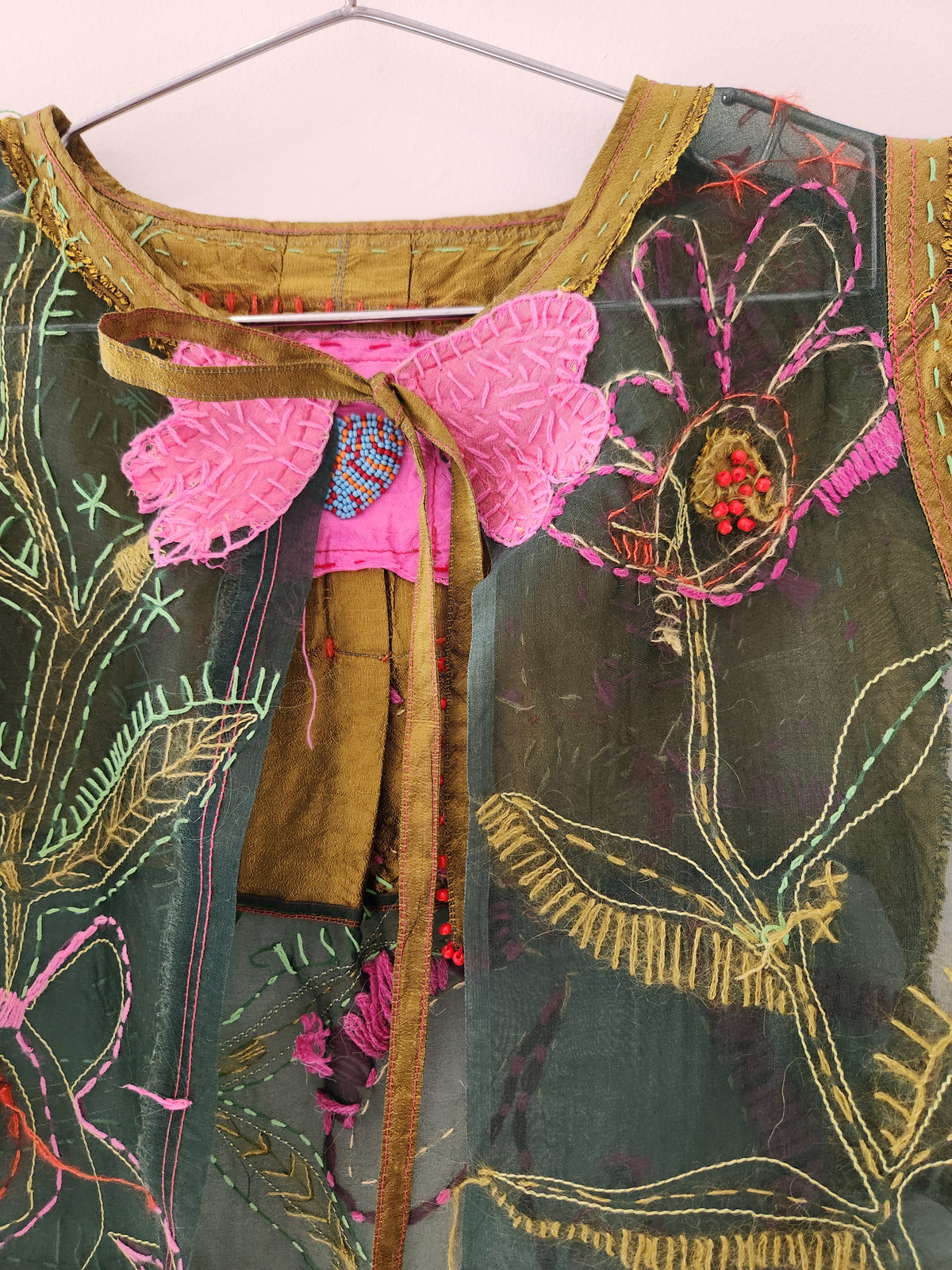 Hand embroidered green silk top